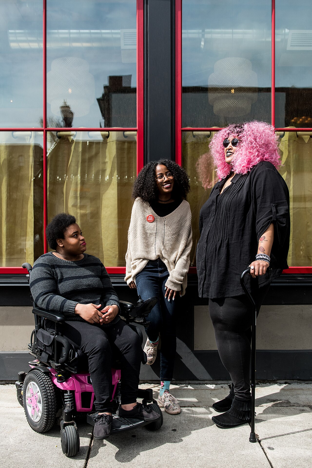 A group of disabled people spending time together outdoors