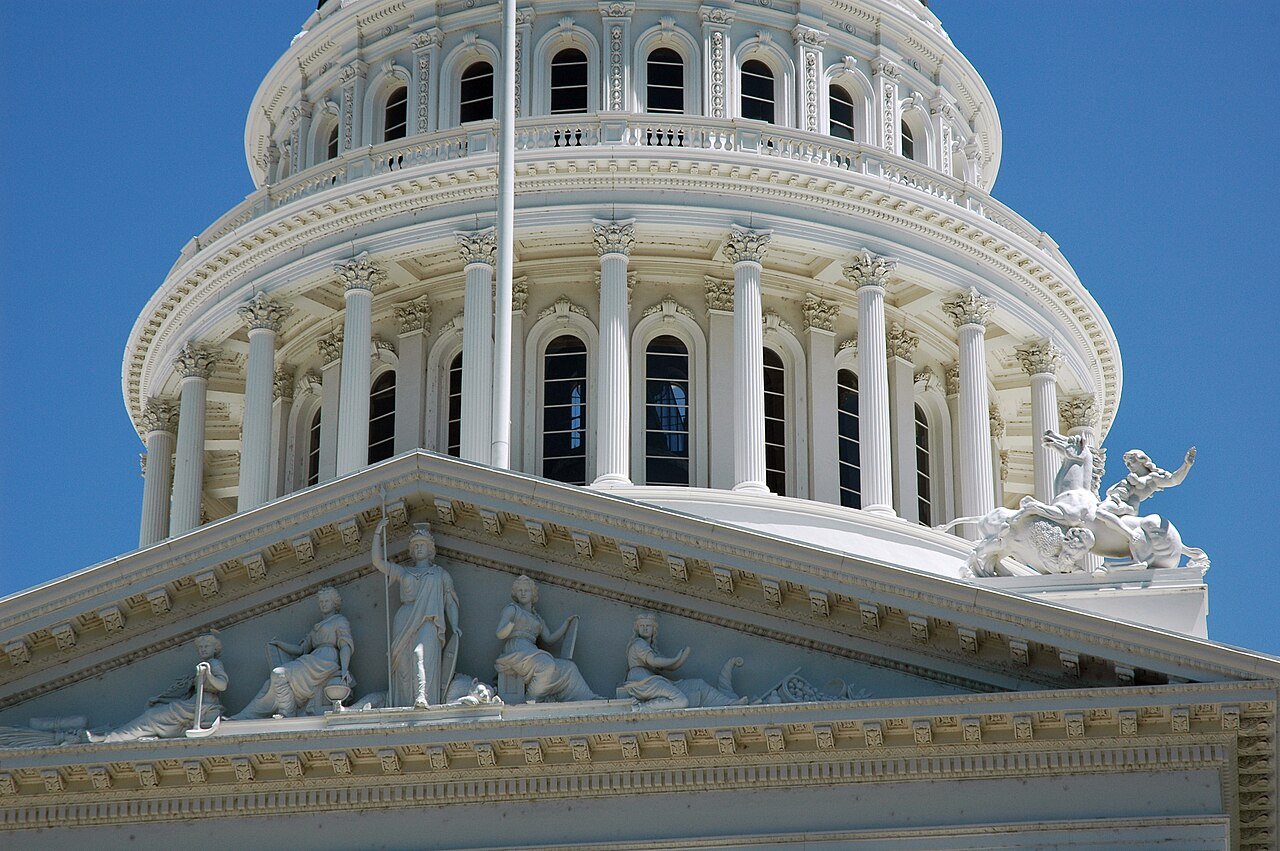 The dome and sculpted pediment of the California State Capitol in Sacramento