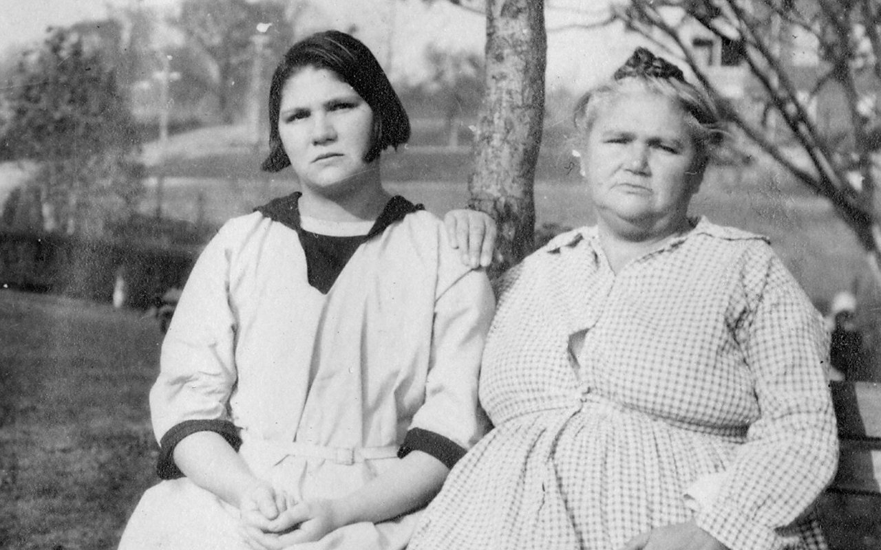 Carrie Buck and her mother, Emma Buck, seated on a bench at the Virginia State Colony in 1924