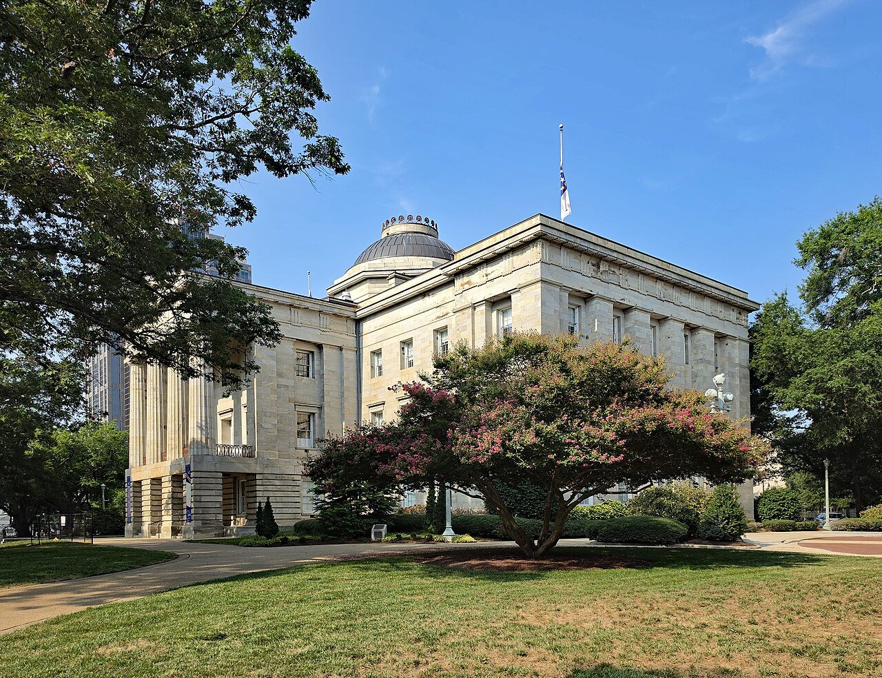 The North Carolina State Capitol in Raleigh framed by trees