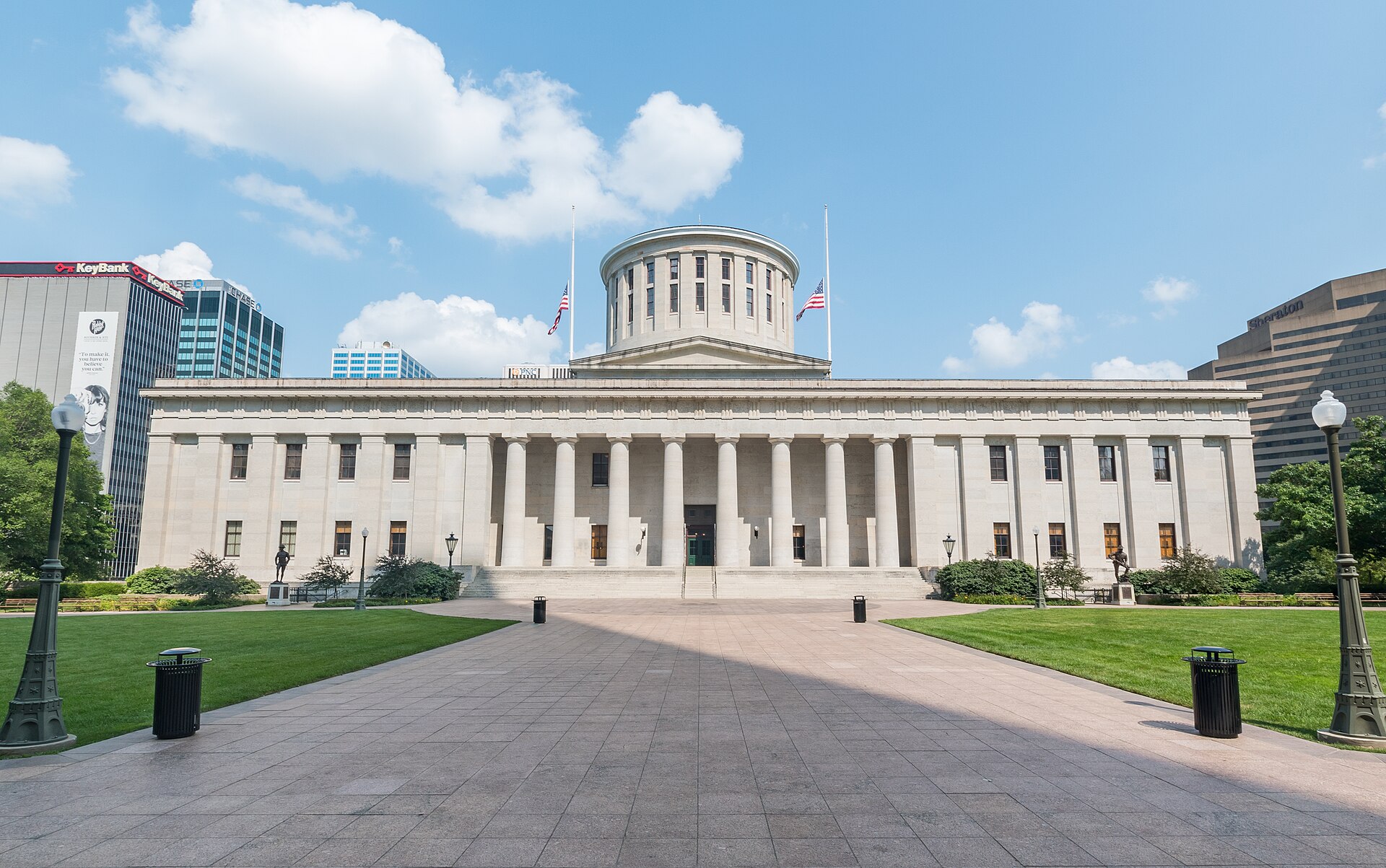 The Ohio Statehouse in Columbus under a blue sky
