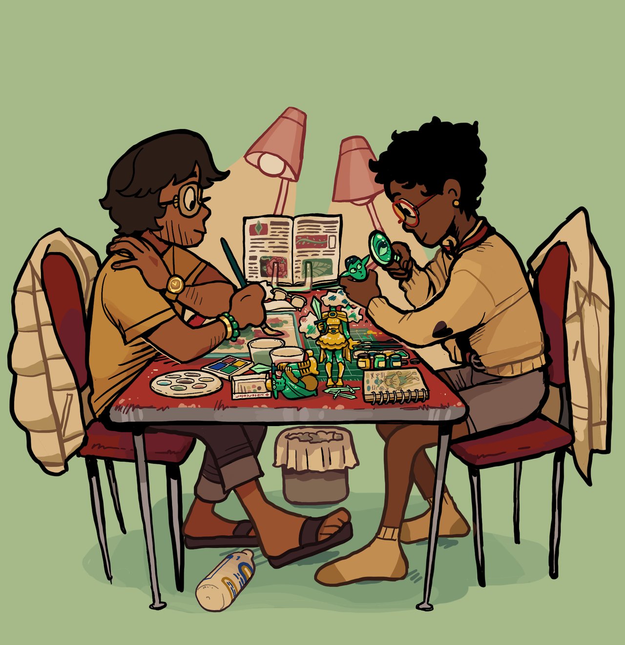 Two people paint small figurines at a table covered in art supplies